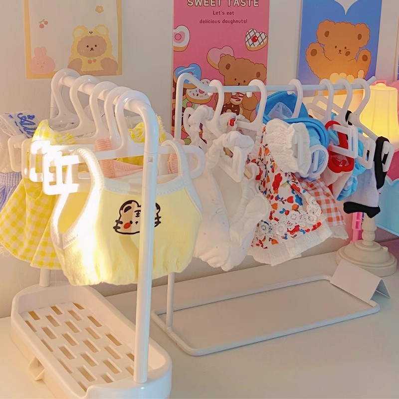 رف تخزين ملابس الدمى القطنية 2 - مراجعة Baby Clothing Types وسعره